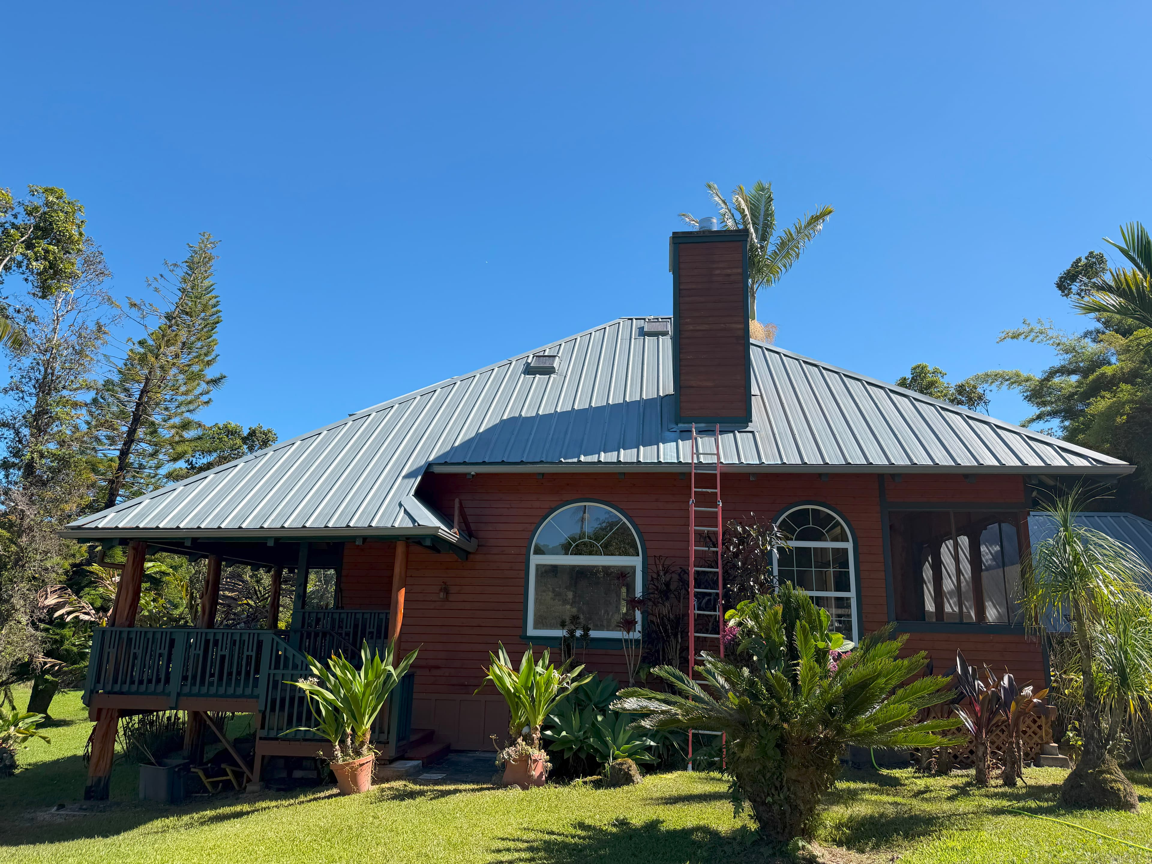 Home roof after soft wash roof cleaning on Oahu Hawaii