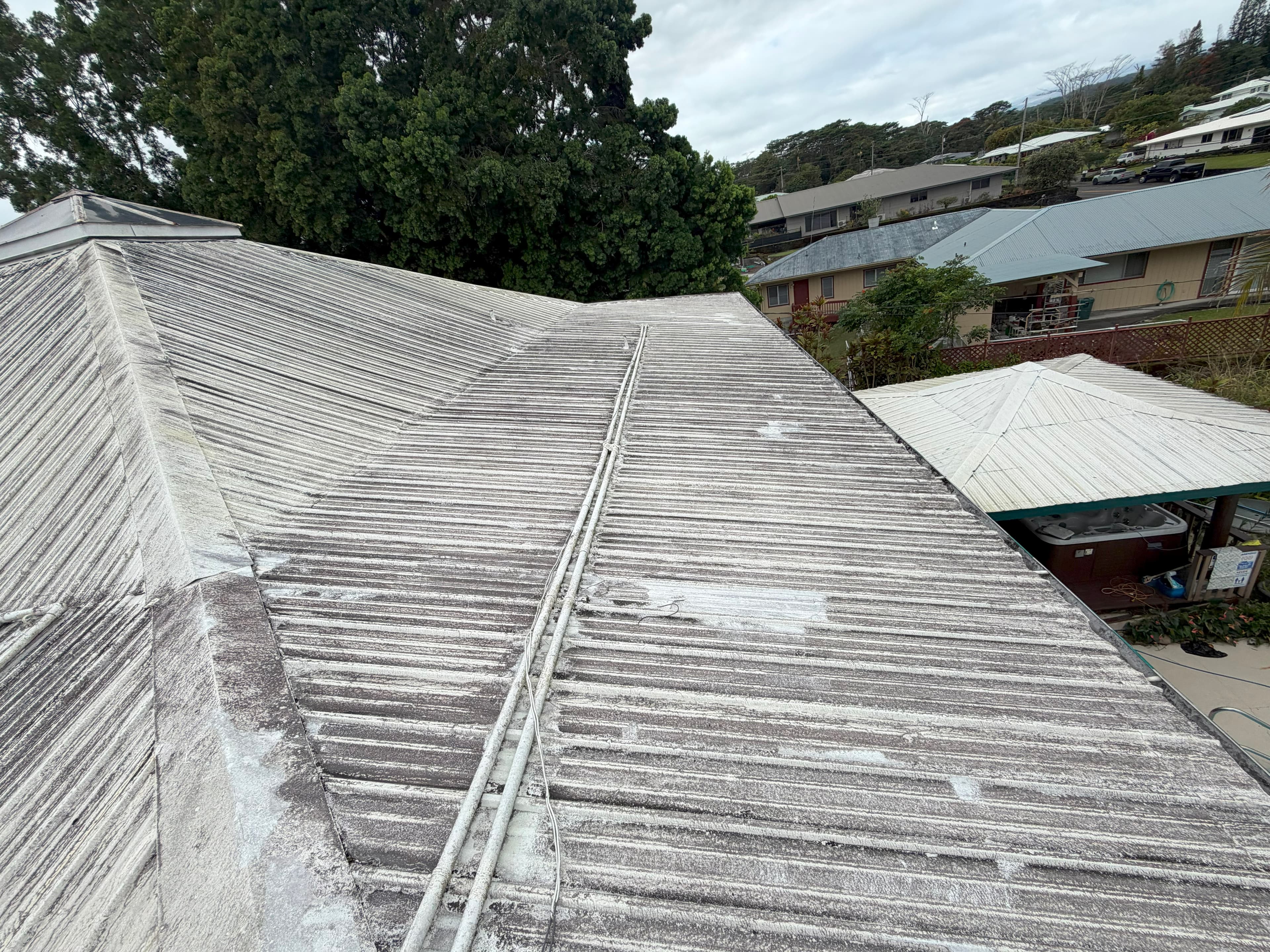 Roof before soft washing on Oahu Hawaii